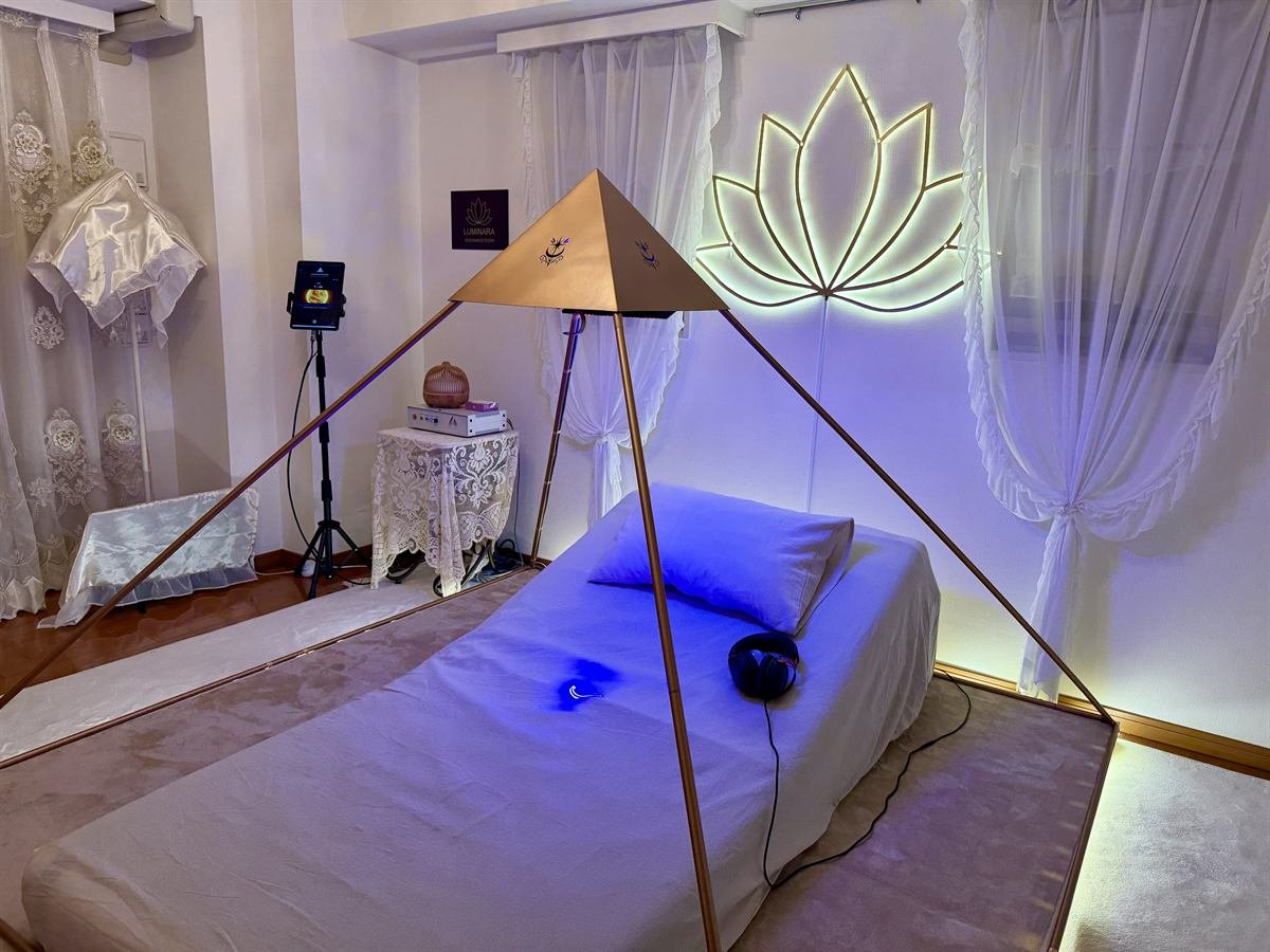 Ginza Pyramid wellness room detail with lotus wall light